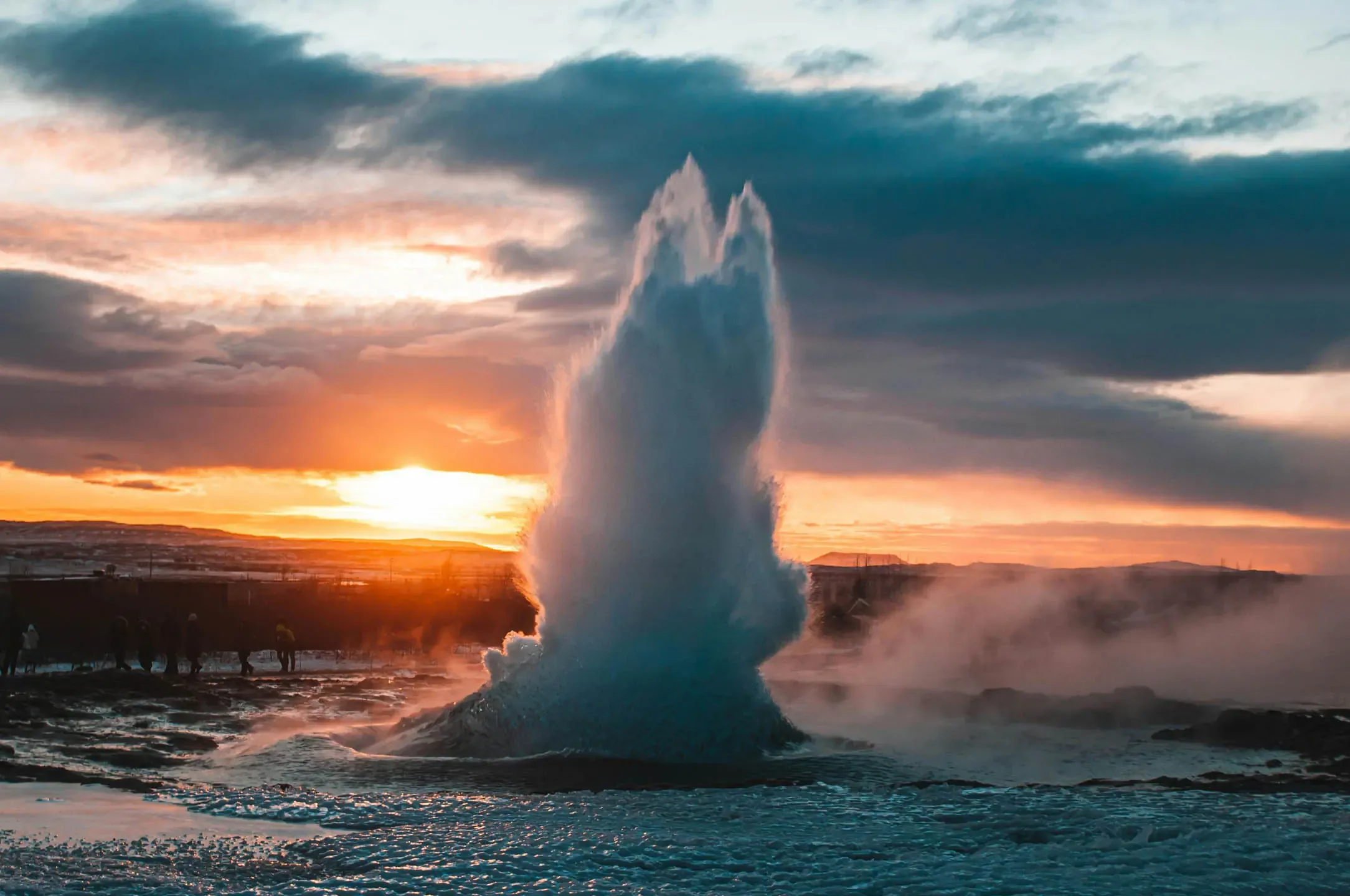 Strokkur geyser at sunset on a Golden Circle Snaefellsnes campervan itinerary in Iceland
