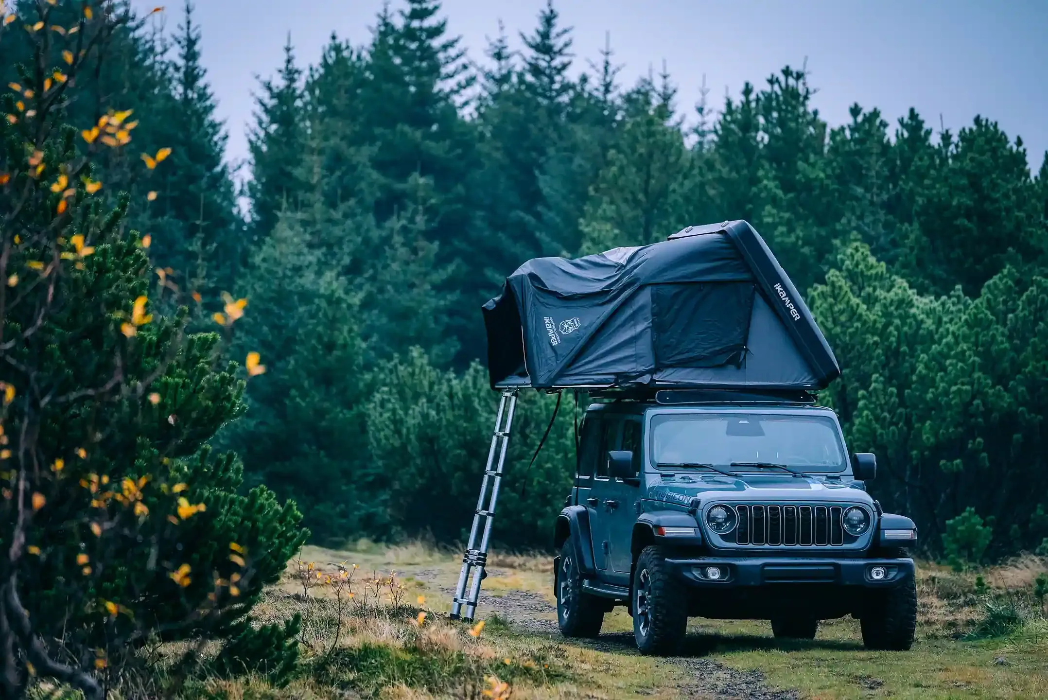 Jeep camper with roof tent in Icelandic nature