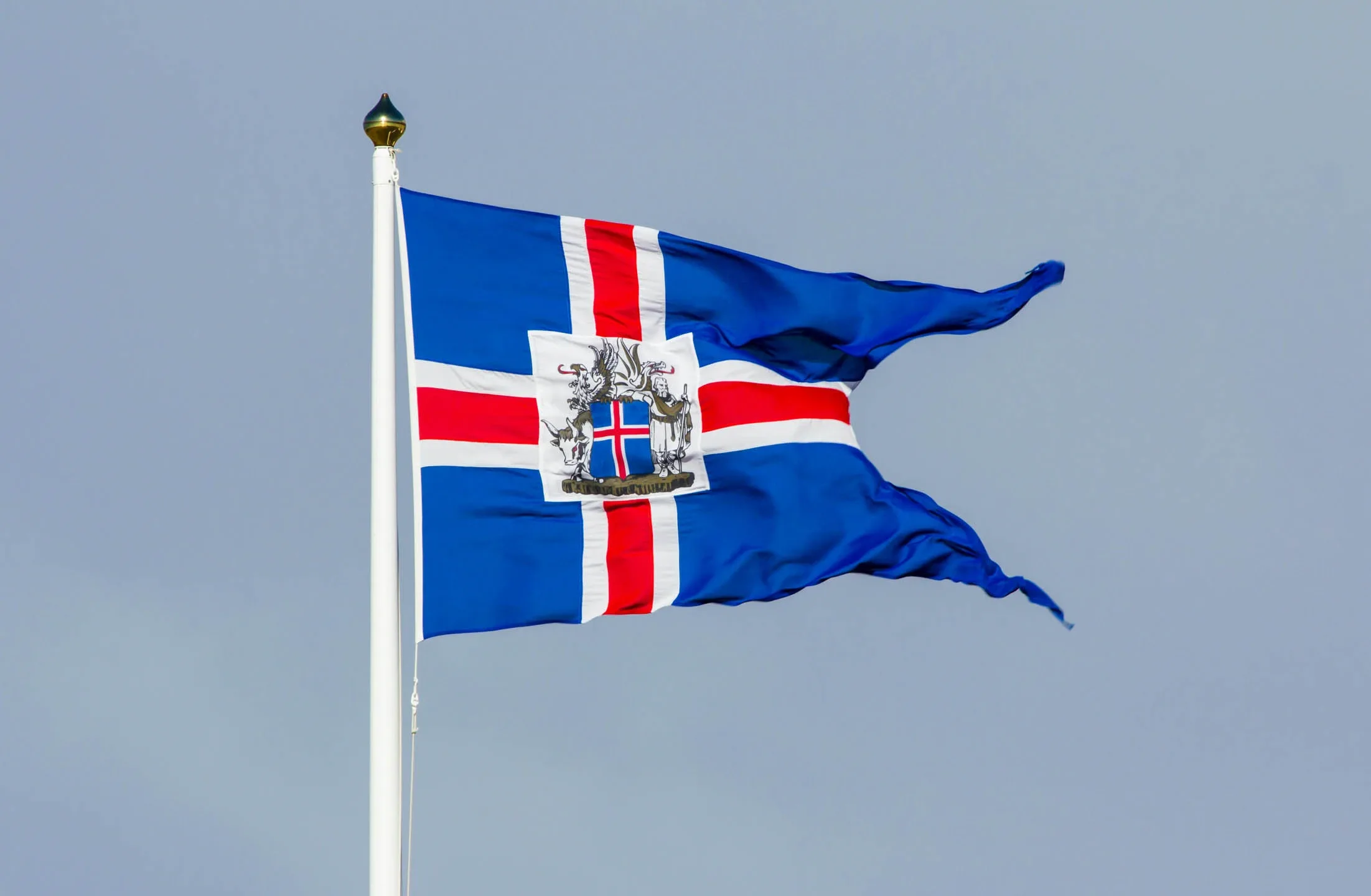 Icelandic flag representing Schengen rules and visa requirements to travel to Iceland
