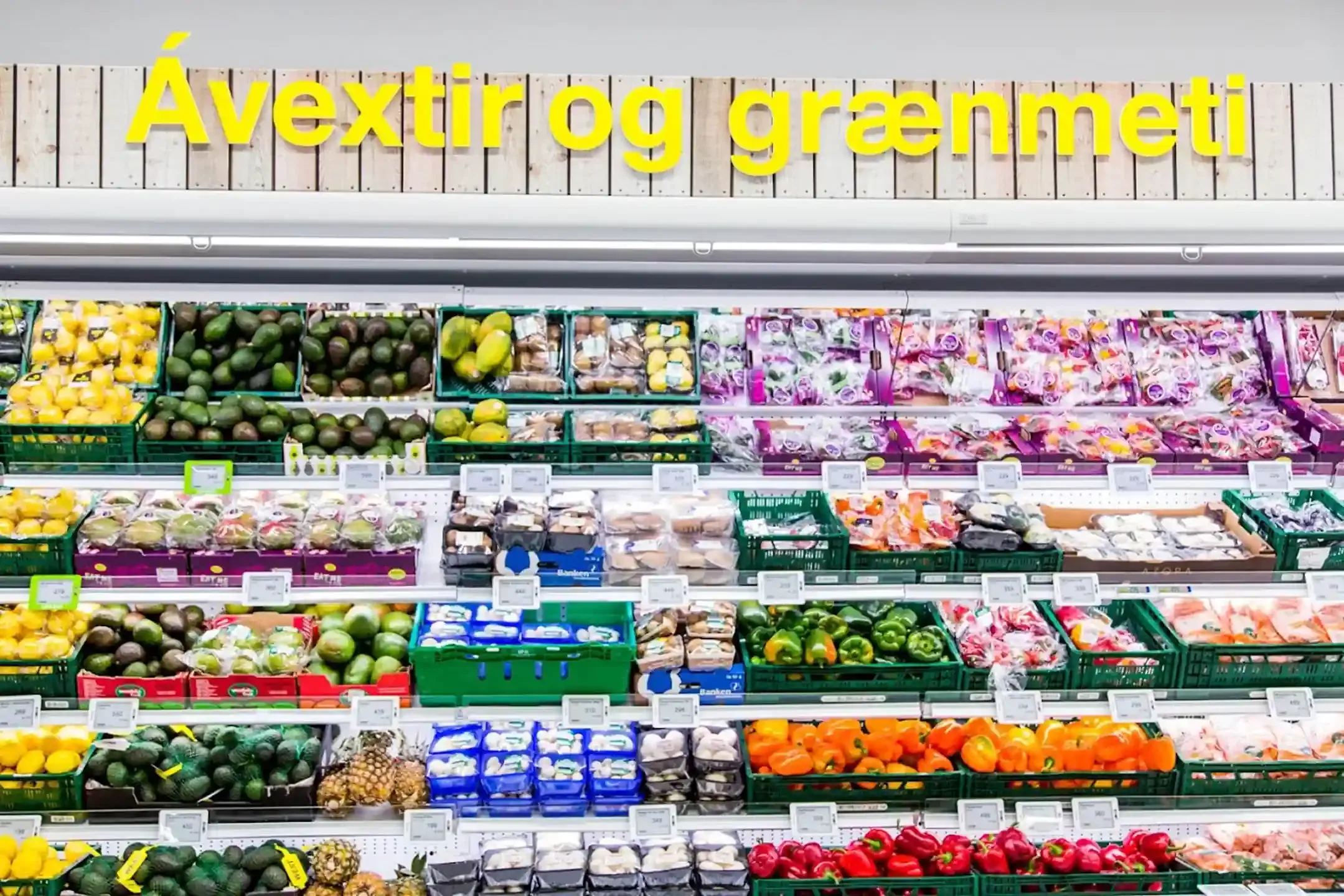 Fresh produce section in an Icelandic supermarket, similar to what travelers look for when grocery shopping in Iceland