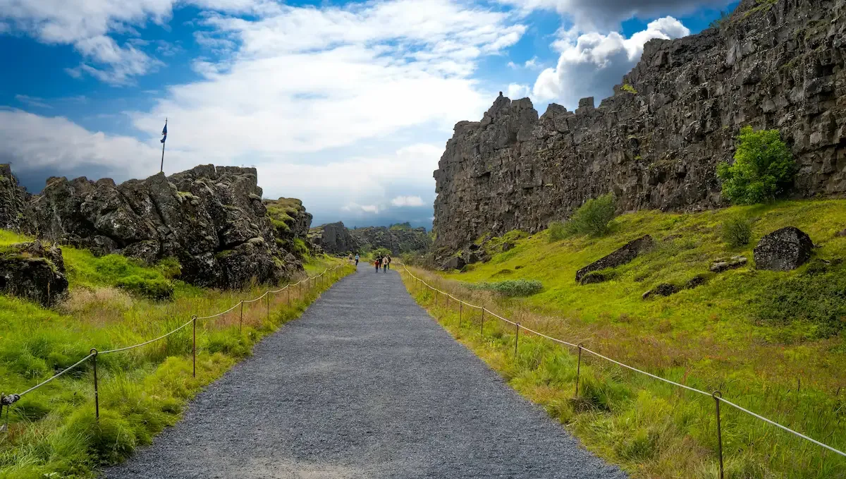 Walking path through the tectonic rift valley at Þingvellir National Park on Iceland’s Golden Circle
